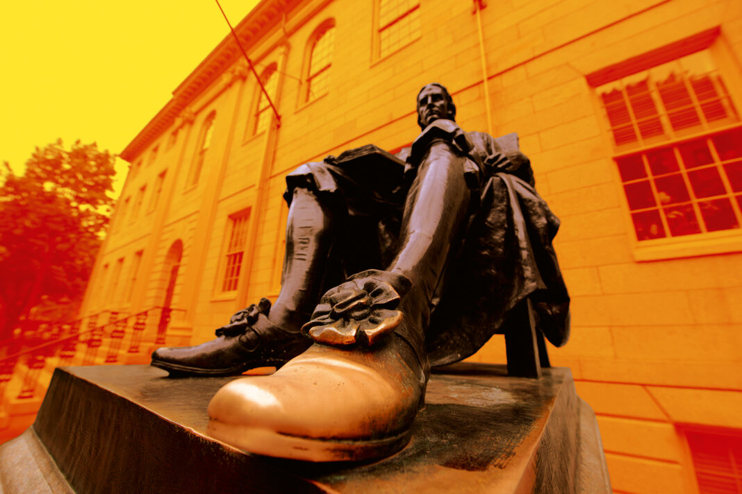 John Harvard statue in front of University Hall in Old Harvard Y